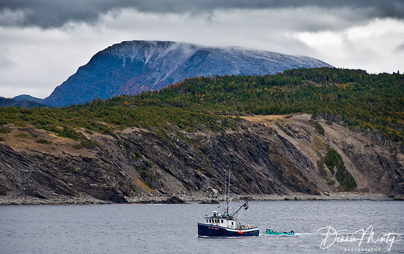 Fishing Boat and Gros Morne Mountain, Gros Morne National Park, Bonne Bay, Newfoundland, Canada